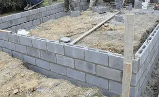 Professionals building a foundation with blocks in Pasadena, CA