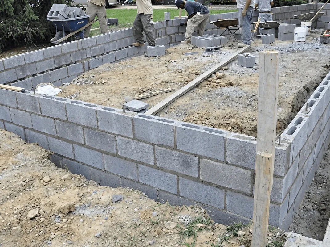 Professionals building a foundation with blocks in Pasadena, CA